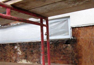 Fake stucco causes severe rot on
                    this 4 year old house in Arlington, Virginia