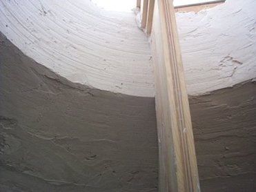 Dome is filled with moulding plaster and lime while template is rotated.