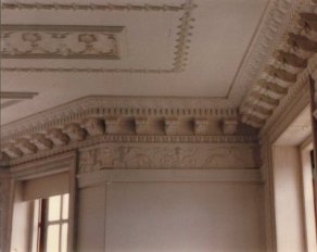 plaster mouldings with a griffin frieze