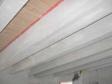 Wood ceiling with plaster beams