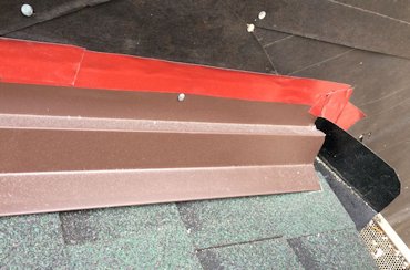 The step flashing is covered with a counter flashing in Bethesda