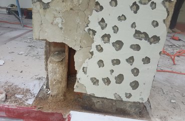 badly deteriorated terra cotta blocks and stucco