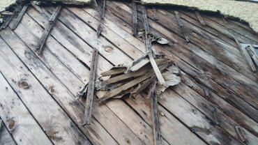 Vertical furring strips had rotted away causing wall to fail in Purcellville, Virginia