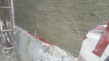 Scratch coat on the metal lath