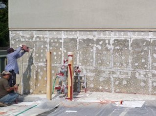 The concrete is chipped up prior to stucco
              application