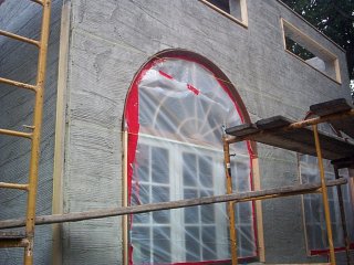 Wood strips
              for windows and balcony openings are set with the strings