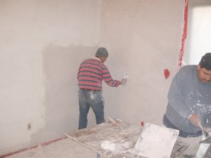 Plaster
              walls for Jarman Company, Inc.