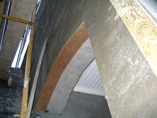 Arch is formed with masonite