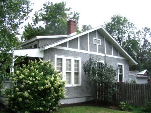 pebble-dash stucco bungalow