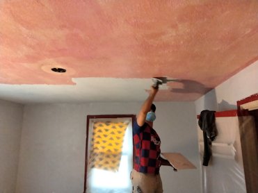 pink plaster weld and coated with veneer basecoat.