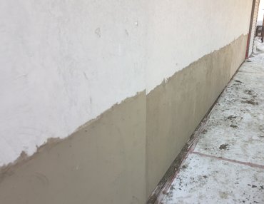 Wall is filled with one inch of cement mortar