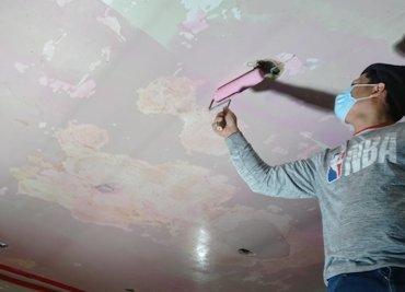 Old ceiling is painted with Plaster weld in Washington, DC