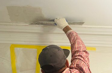 Old plaster moldings are repaired in Washington, DC.