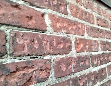 1908 bricks were a little slick and were chipped for a good bond in Washington, DC.