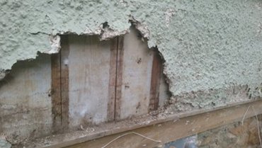 Deteriorated metal lath is the culprit of the
stucco failing..