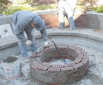 Bricks are used for the fire pit to
                allow a tighter radius.