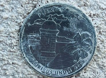 
                A Puerto Rico commemorative quarter.