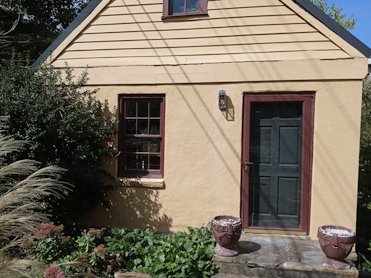 small house in front was an apothecary