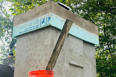 The first band on the chimney cap is formed with styrofoam and filled in.