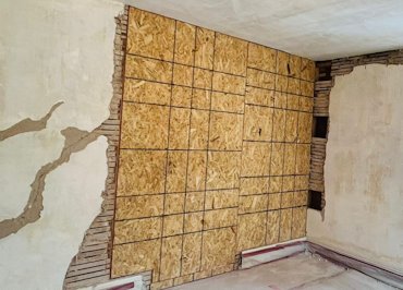 Wall that needed additional bracing was covered with 3/8 OSB.