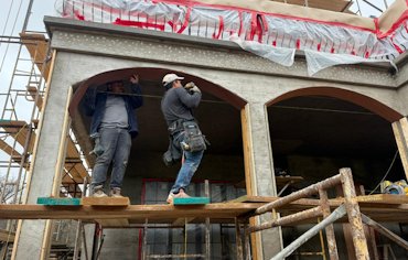 Arches are formed using strips of masonite.