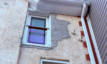 old house needed other stucco repairs.