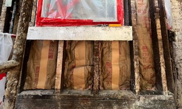 Insulation in bay window.