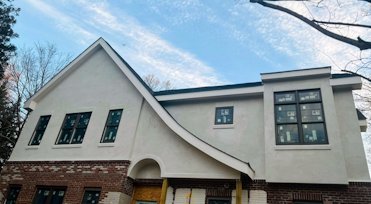 REAL cement stucco addition in Arlington, Virginia