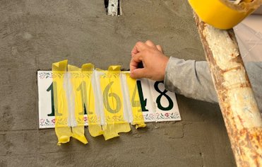 Numbers are covered with frog tape