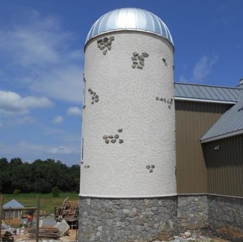 Stucco on this concrete silo in Taylorstown, Virginia