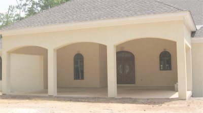 Stucco arches and patio finished.