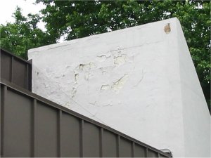Badly spalled stucco