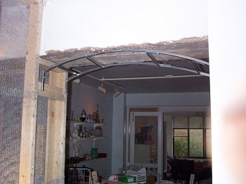 Lath and plaster arch is reconstructed in circa 1941 apartment